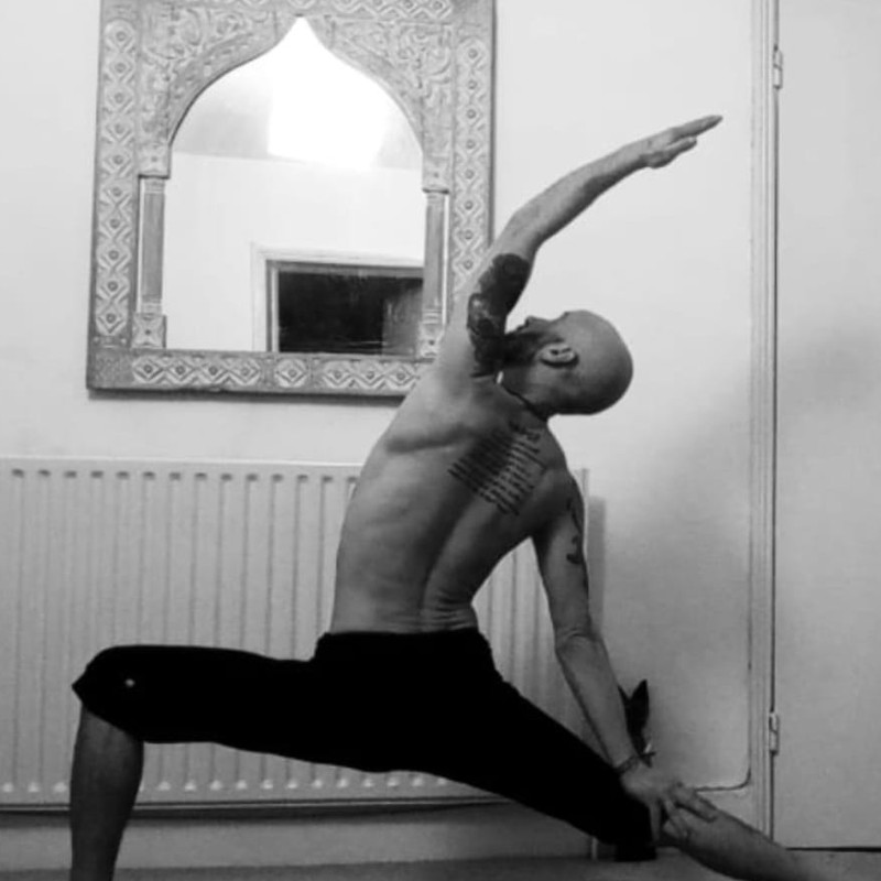 Nuno in a yoga lunge pose